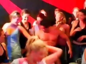 Blonde hoe gets tits licked by stripper at an orgy