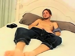 Amateur stud showing his feet and tugging his cock