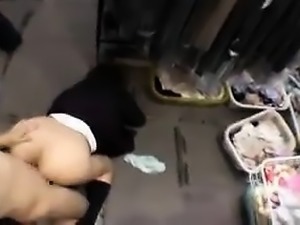 Adorable Asian schoolgirl lies on her back and takes a deep
