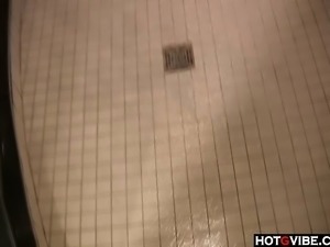 Blondie fingers her pussy in the shower