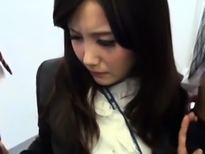 Japanese office honey relaxes whilst getting pussy teased