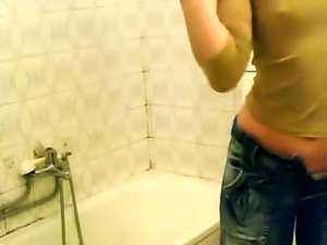 Amateur teen with a marvelous ass gets naked in the bathroom