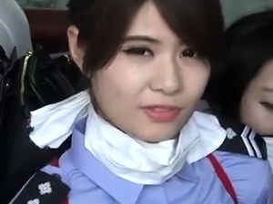 Two charming Asian girls in uniform get trained in bondage