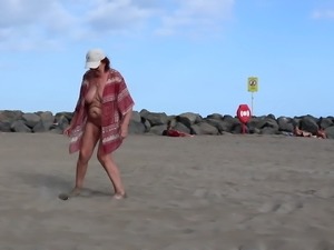 Naked entertainment on a public beach