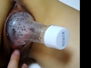 Plastic bottle into her pussy (HD)