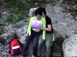 Stacked Japanese milf enjoys a young cock in the outdoors