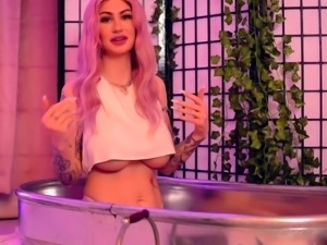 Playful webcam model puts her amazing big boobs on display
