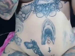 Tattooed Chick fingerfucking herself and loves it