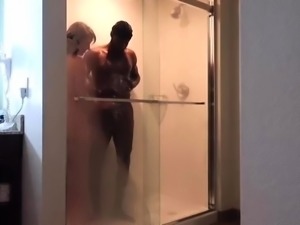 Lustful milf having sex with black lover in the shower