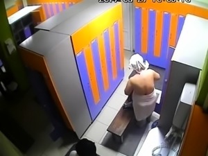 Spy cam in locker room captures mature women getting naked
