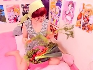 Wild redhead camgirl satisfies herself with vegetables
