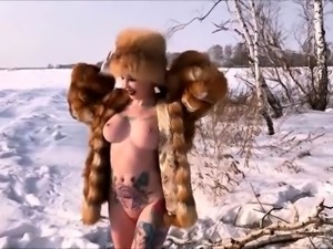 Inked busty redhead gets her hungry ass stretched outdoors